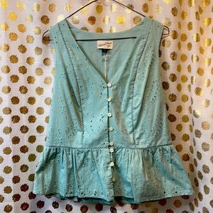 Sleeveless sage top with buttons down the front